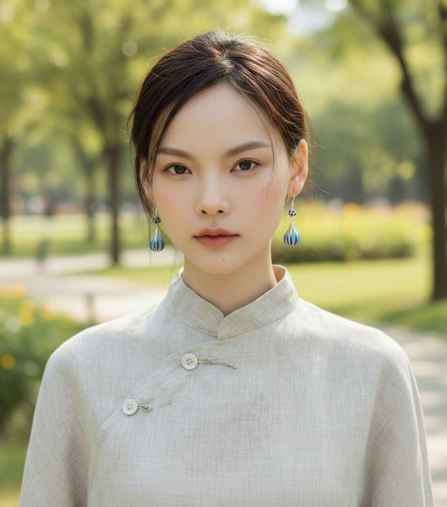 Deep blue enamel droplet earrings reflecting calm ocean tones — handmade enamel silver earrings ideal for poetic and elegant styles.