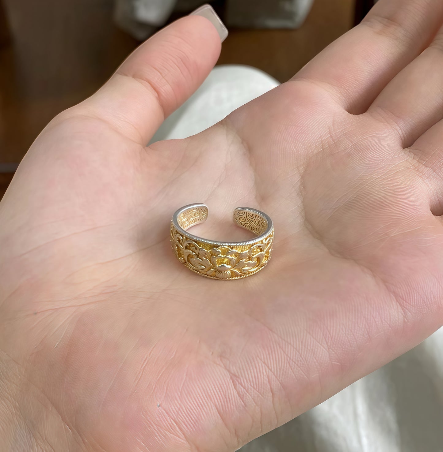 Vintage Chinese silver filigree ring with chrysanthemum relief carving, semi-handmade sterling silver jewelry symbolizing resilience and purity.