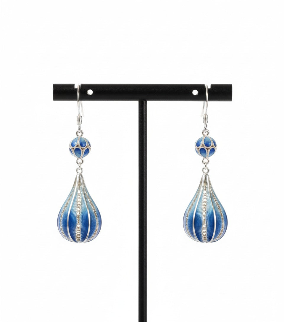 Deep blue enamel droplet earrings reflecting calm ocean tones — handmade enamel silver earrings ideal for poetic and elegant styles.
