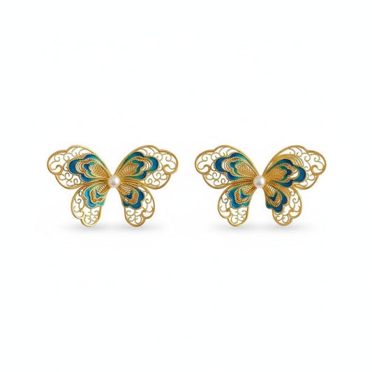 Gold-plated silver butterfly earrings crafted with filigree inlay, handmade jewelry symbolizing freedom and beauty in an oriental aesthetic.