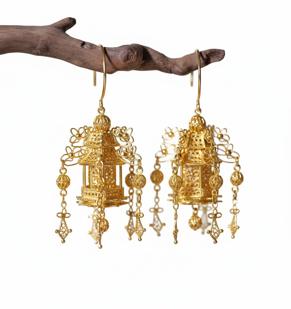 Handmade silver earrings with lantern-inspired filigree motif — symbolizing warmth and reunion, perfect for festive occasions and gifting.
