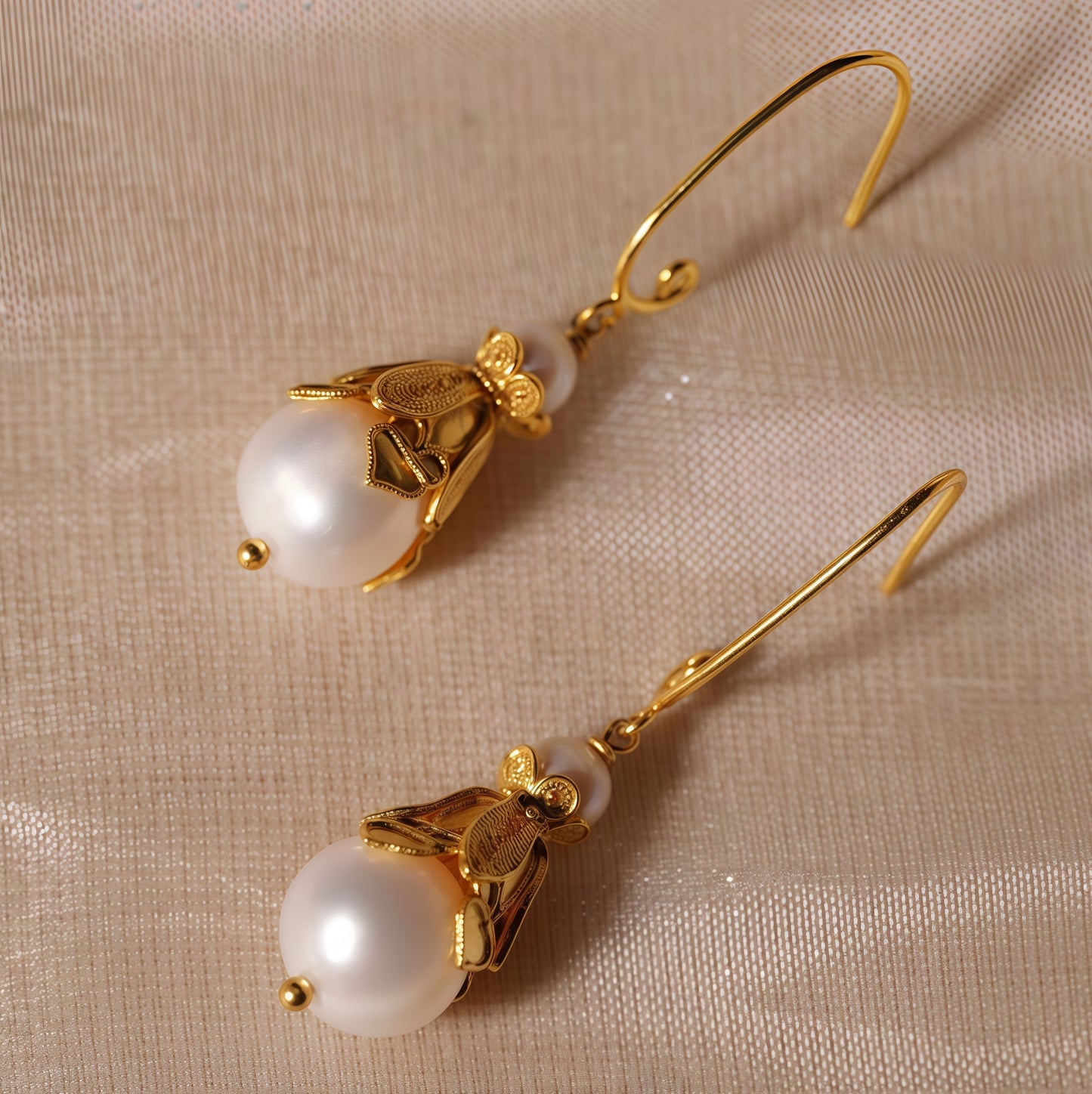 Handmade silver earrings featuring natural pearls set in delicate filigree — lightweight and elegant, perfect for everyday wear or gifting.
