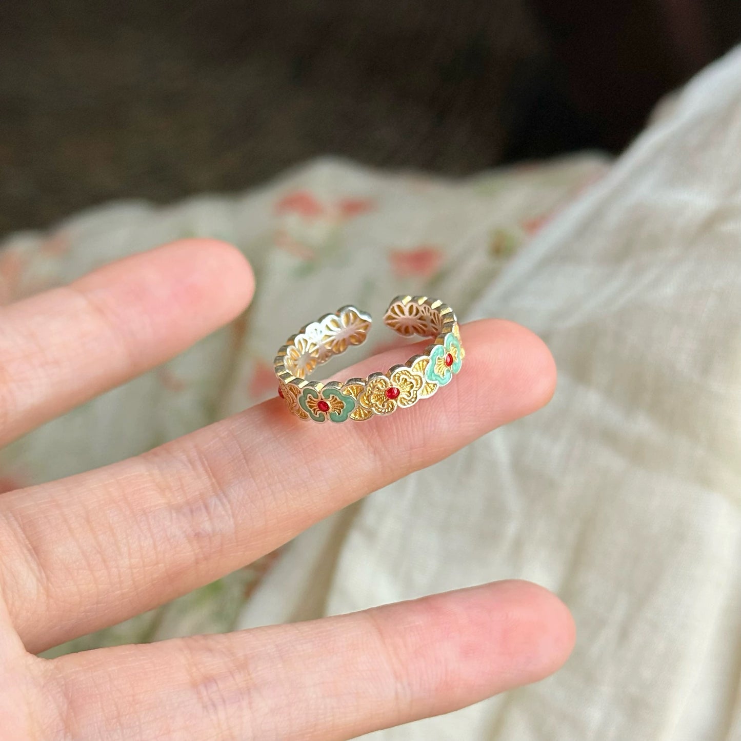 Sterling silver enamel ring inspired by delicate petals — combines enamel artistry with fine handmade silver craftsmanship, ideal with enamel earrings.
