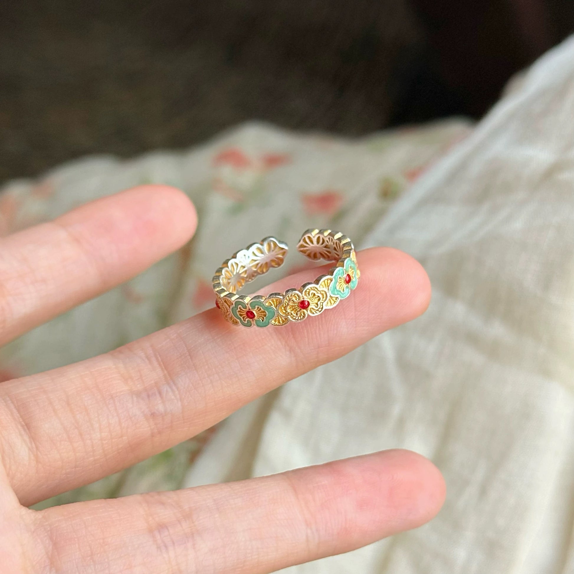 Sterling silver enamel ring inspired by delicate petals — combines enamel artistry with fine handmade silver craftsmanship, ideal with enamel earrings.
