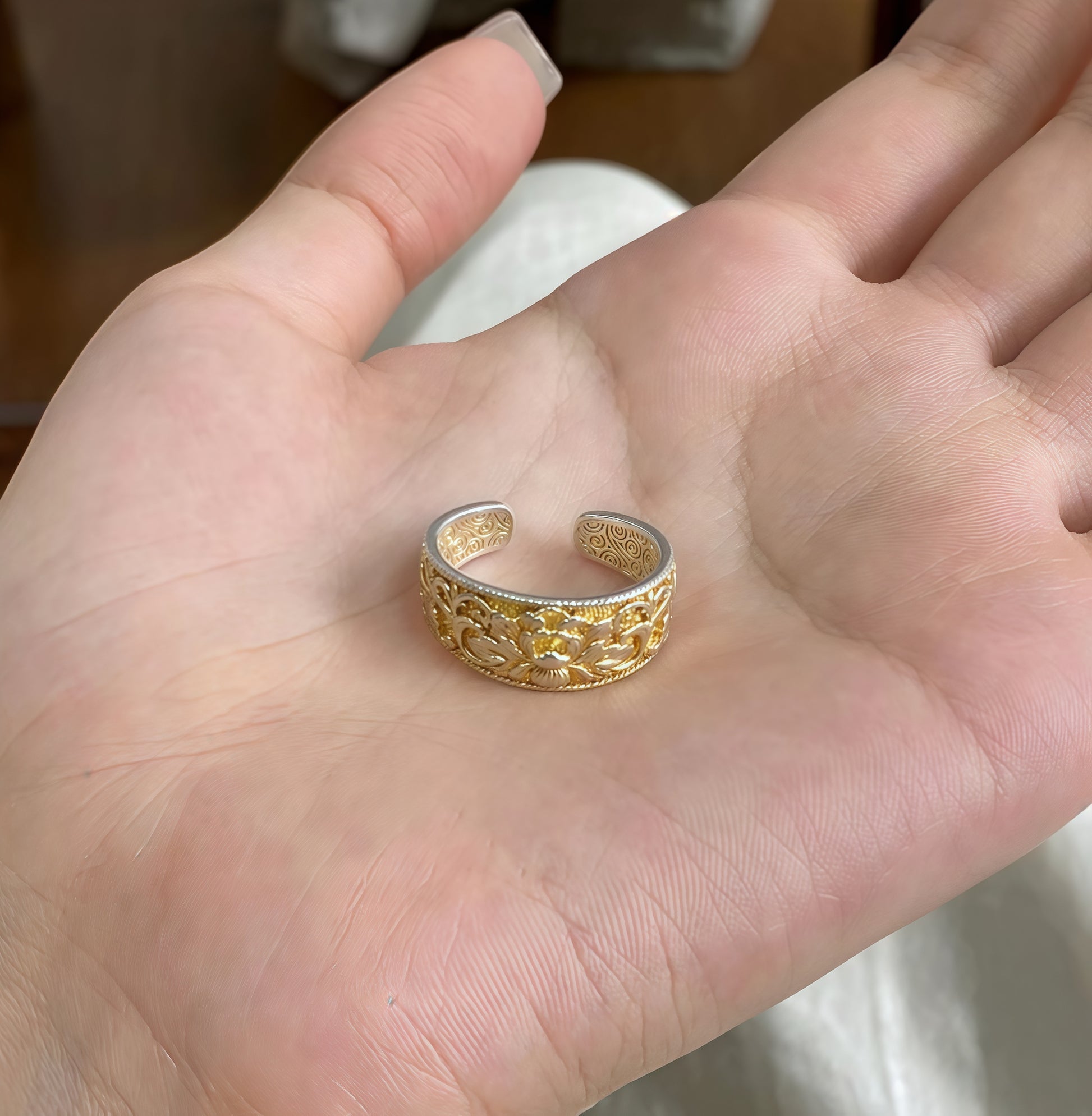 Vintage Chinese silver filigree ring with chrysanthemum relief carving, semi-handmade sterling silver jewelry symbolizing resilience and purity.
